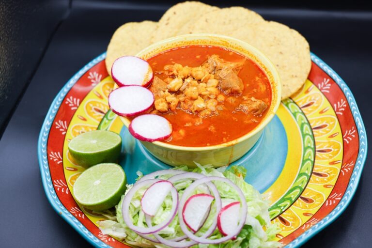 Pork, hominy and red broth, served with radish, tortillas and lime at Super Carniceria.